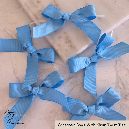Light Blue Grosgrain Bows With Clear Twist Ties - Pack of 25